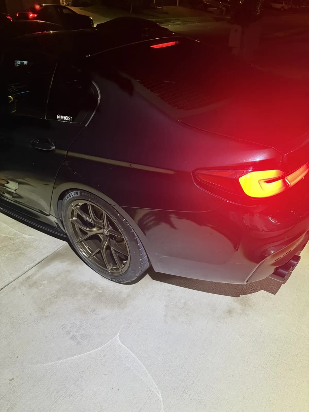 Black BMW photographed by JX Auto Lab
