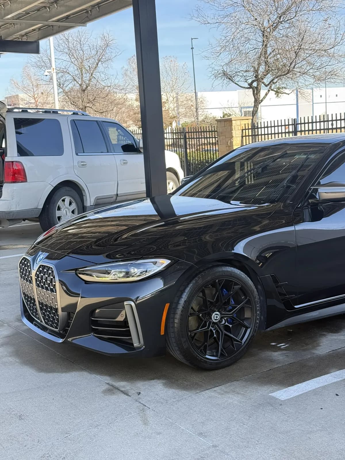 Black BMW photographed by JX Auto Lab