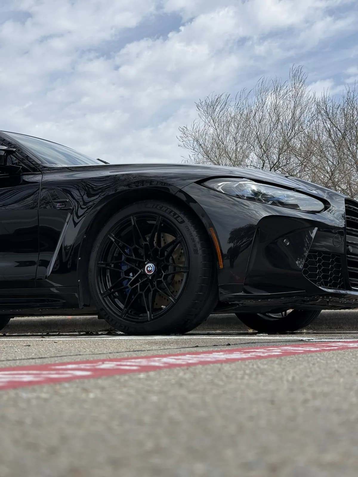 Black BMW photographed by JX Auto Lab