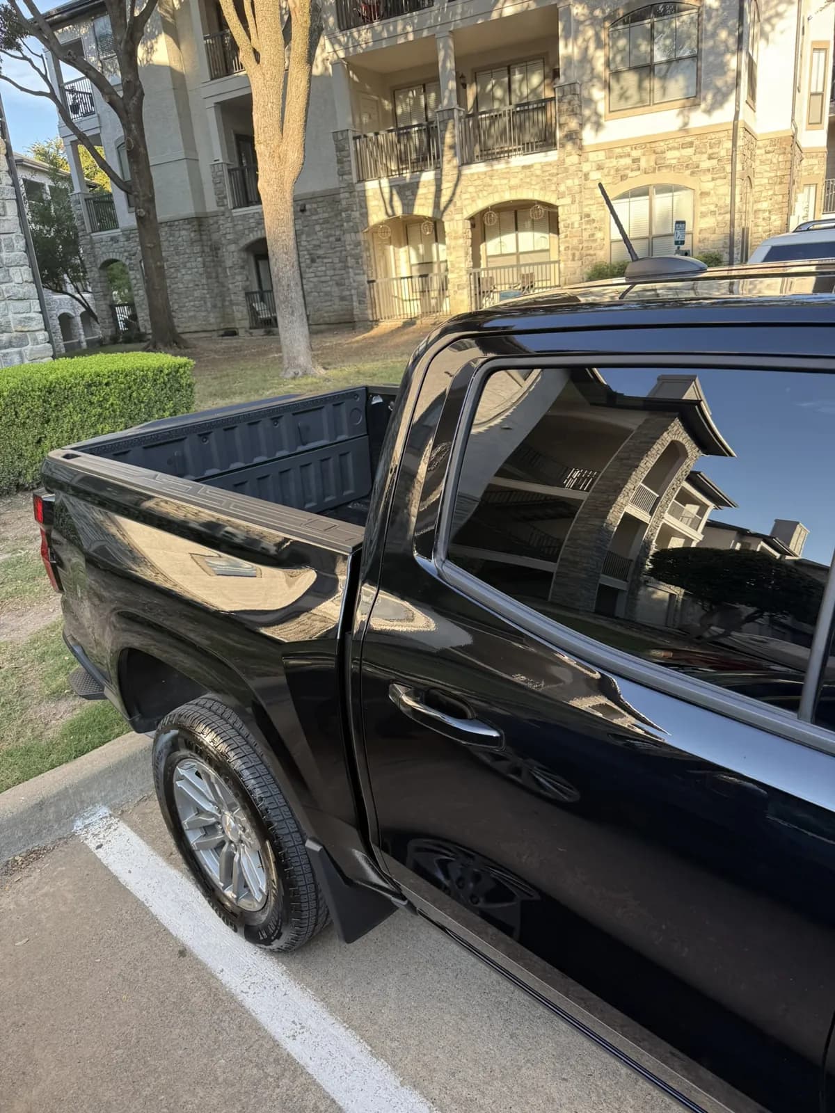 Black pickup photographed by JX Auto Lab