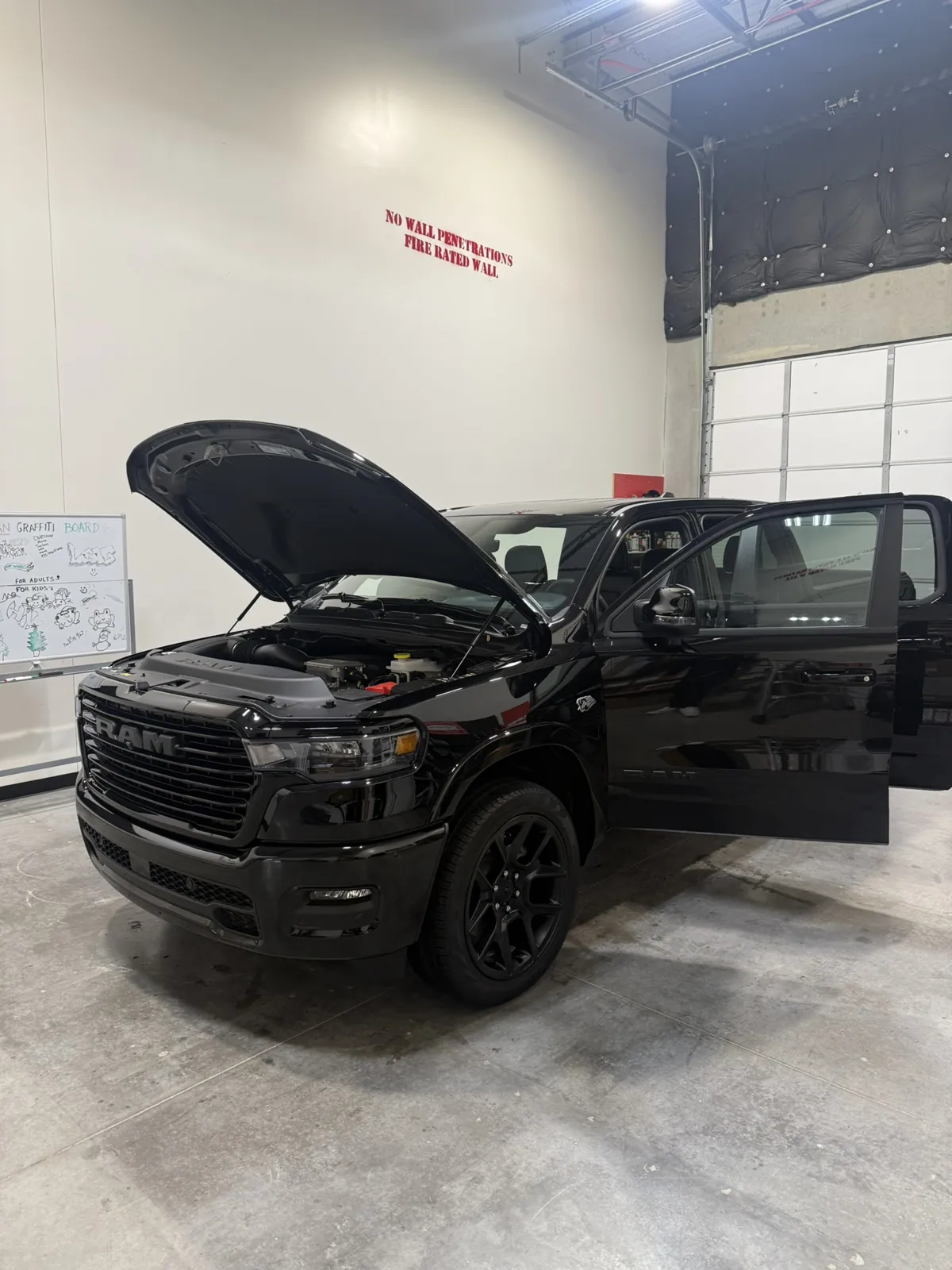 Black pickup photographed by JX Auto Lab
