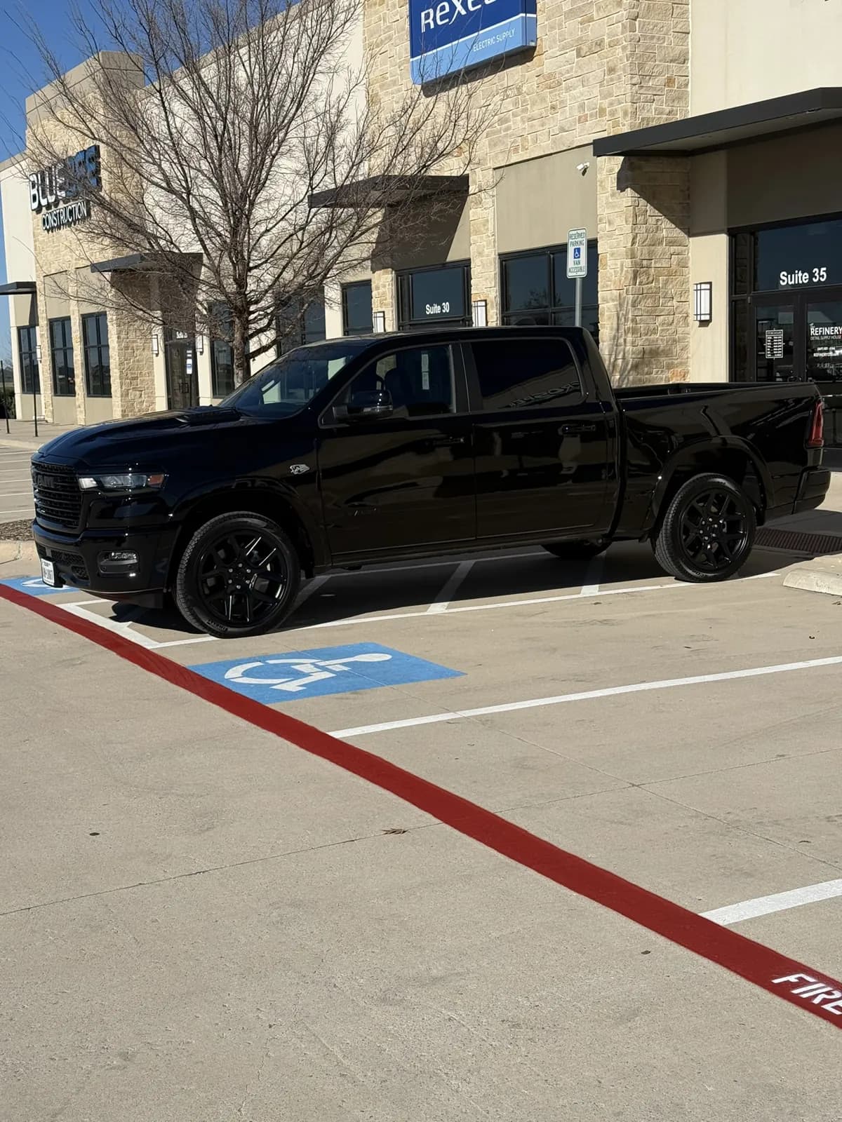 Black pickup photographed by JX Auto Lab