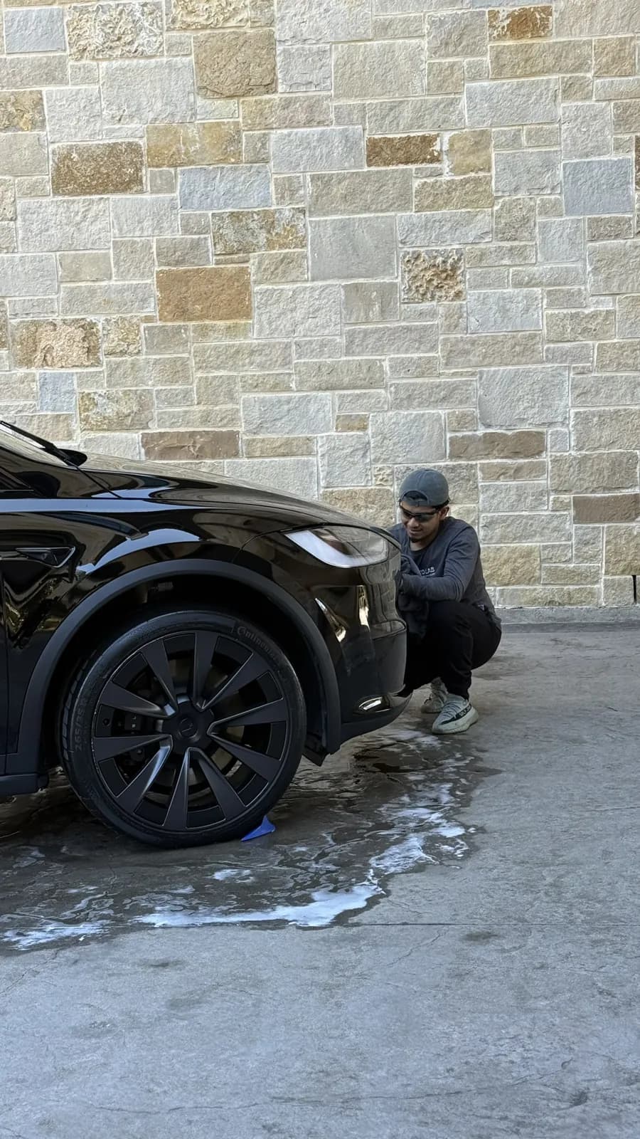 Black Tesla photographed by JX Auto Lab