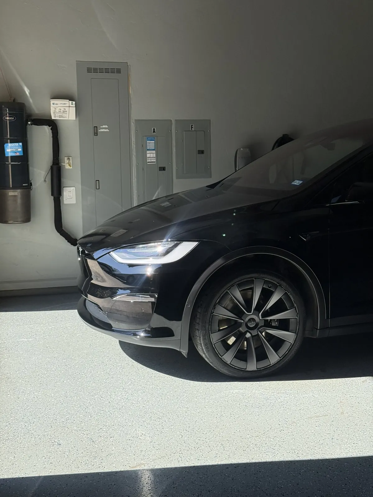 Black Tesla photographed by JX Auto Lab