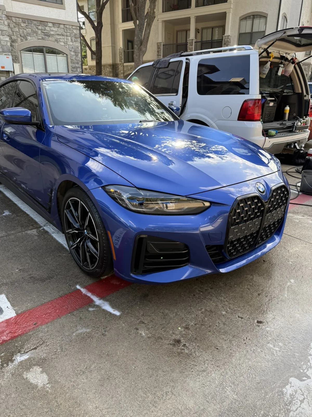 Blue BMW photographed by JX Auto Lab
