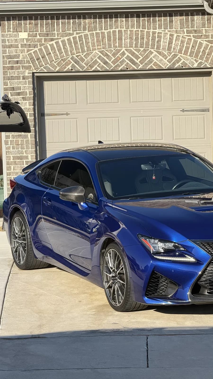 Blue coupe photographed by JX Auto Lab