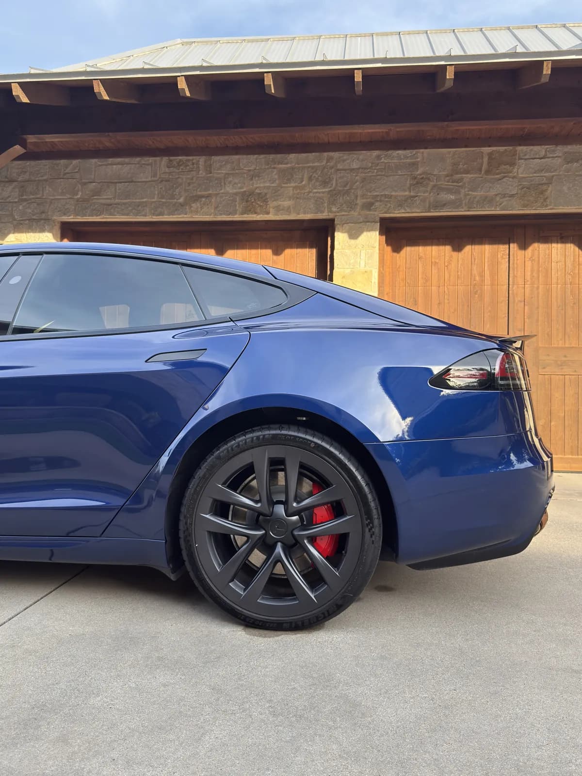 Blue Tesla photographed by JX Auto Lab