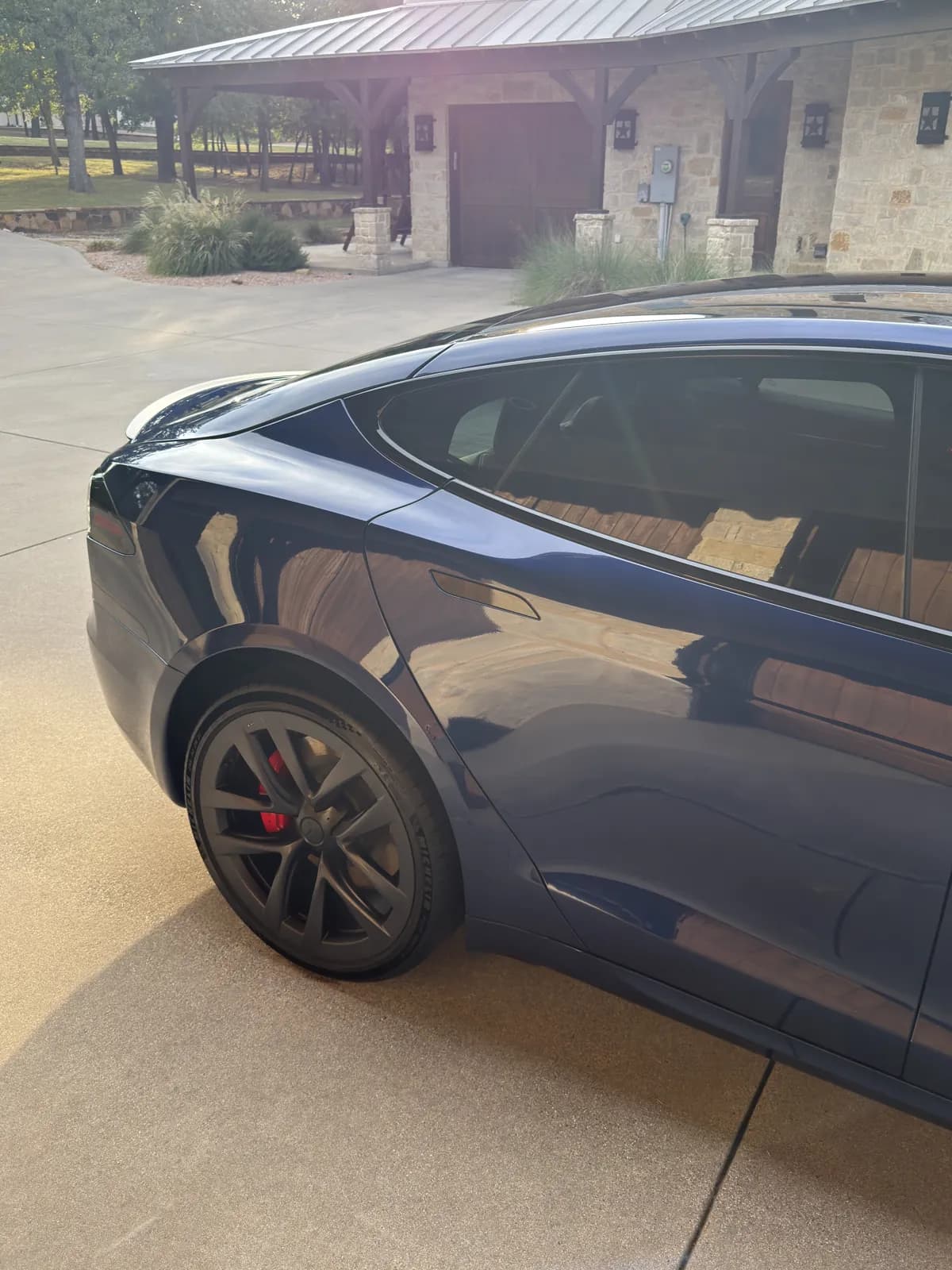 Blue Tesla photographed by JX Auto Lab