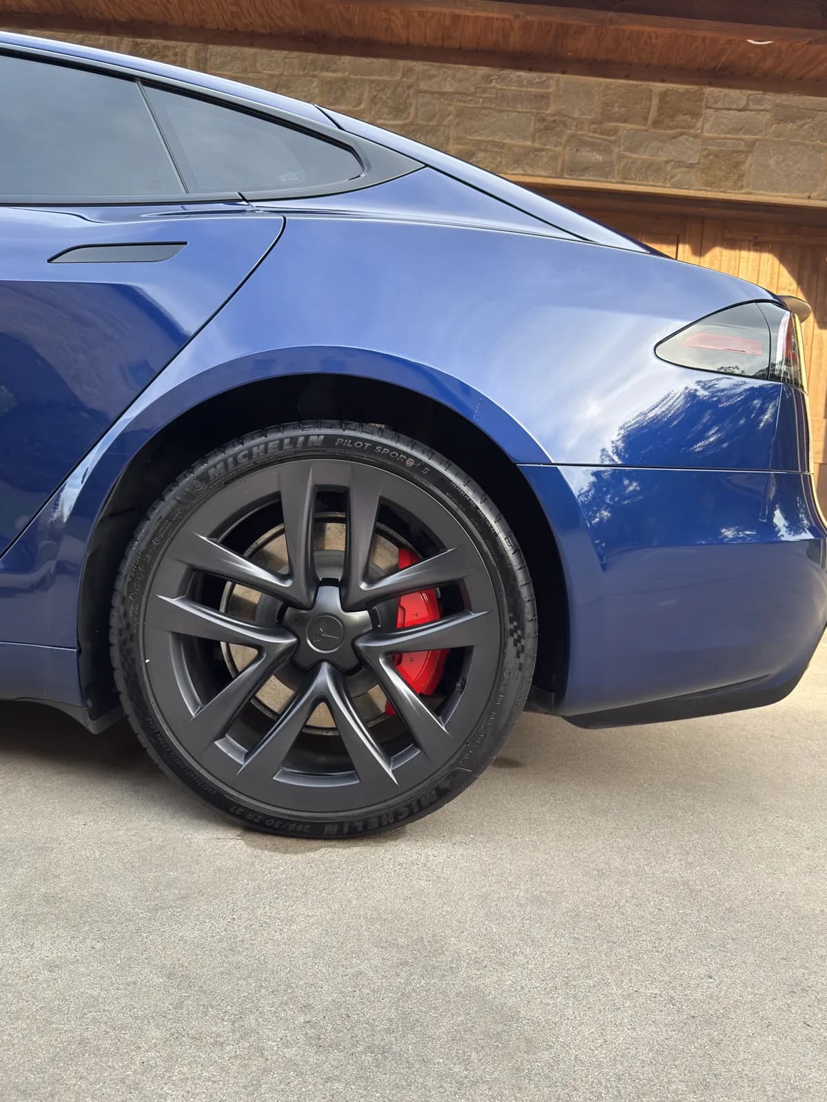 Blue Tesla photographed by JX Auto Lab