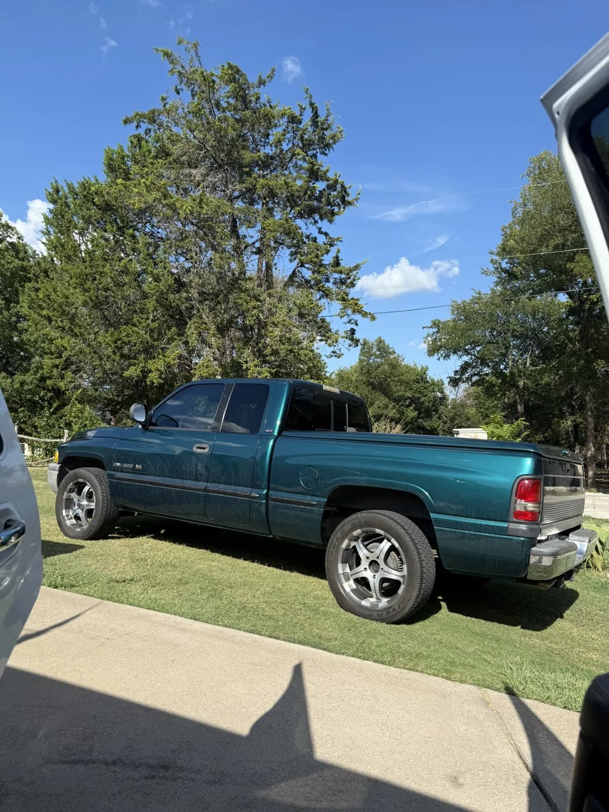 Green pickup photographed by JX Auto Lab
