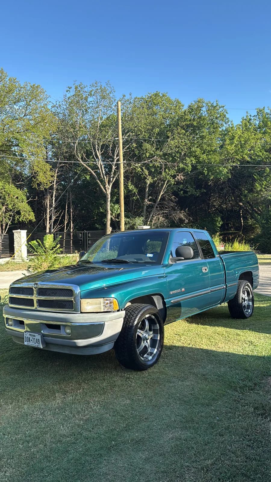 Green pickup photographed by JX Auto Lab