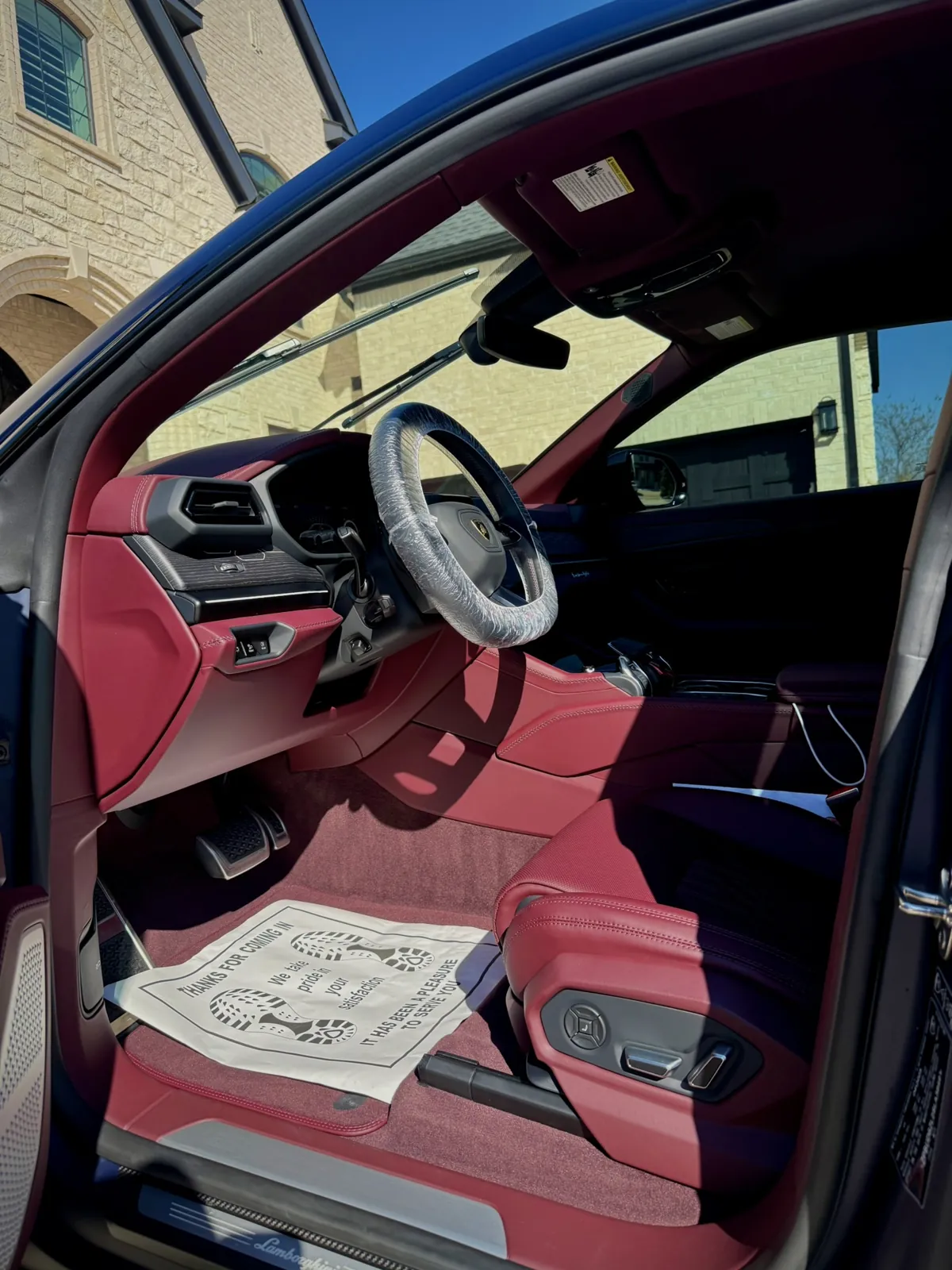 Red leather cabin photographed by JX Auto Lab