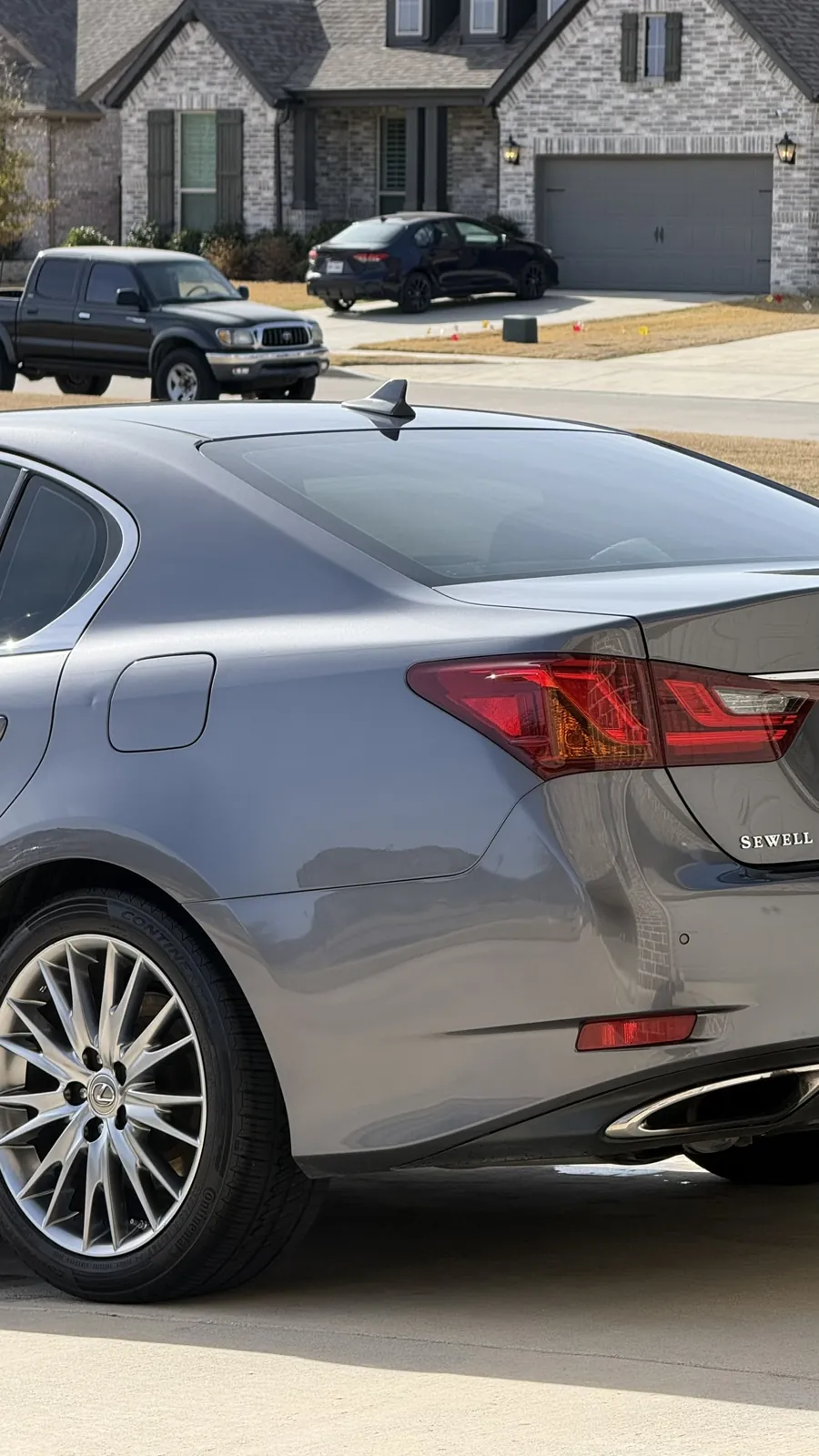 Silver sedan photographed by JX Auto Lab