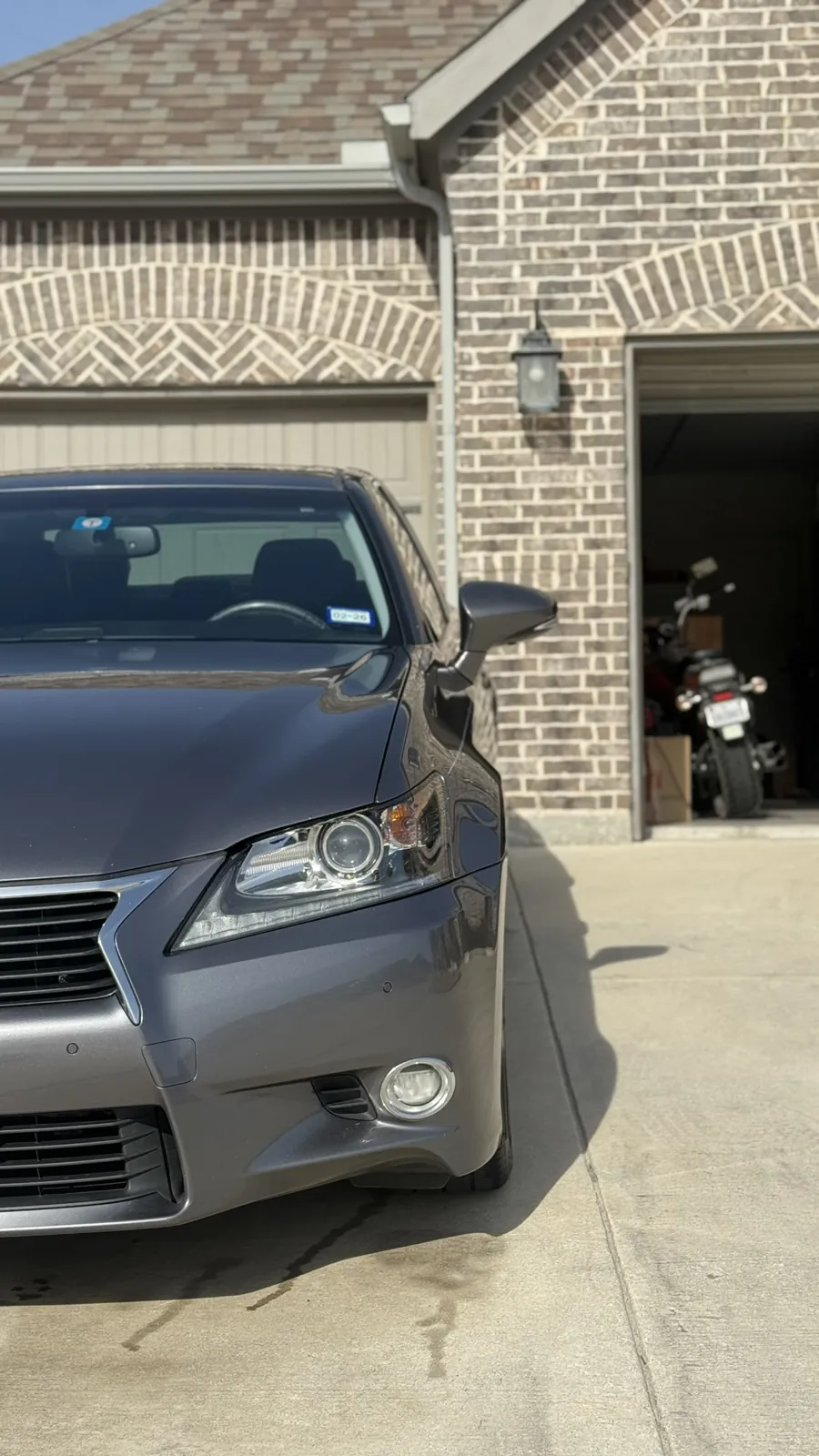 Silver sedan photographed by JX Auto Lab
