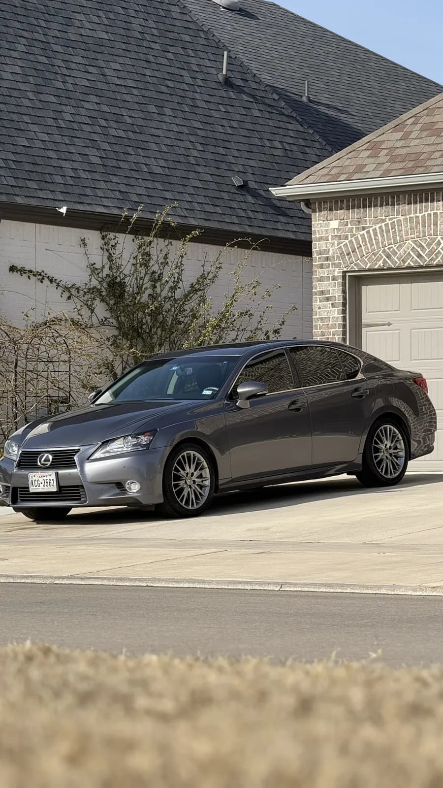 Silver sedan photographed by JX Auto Lab