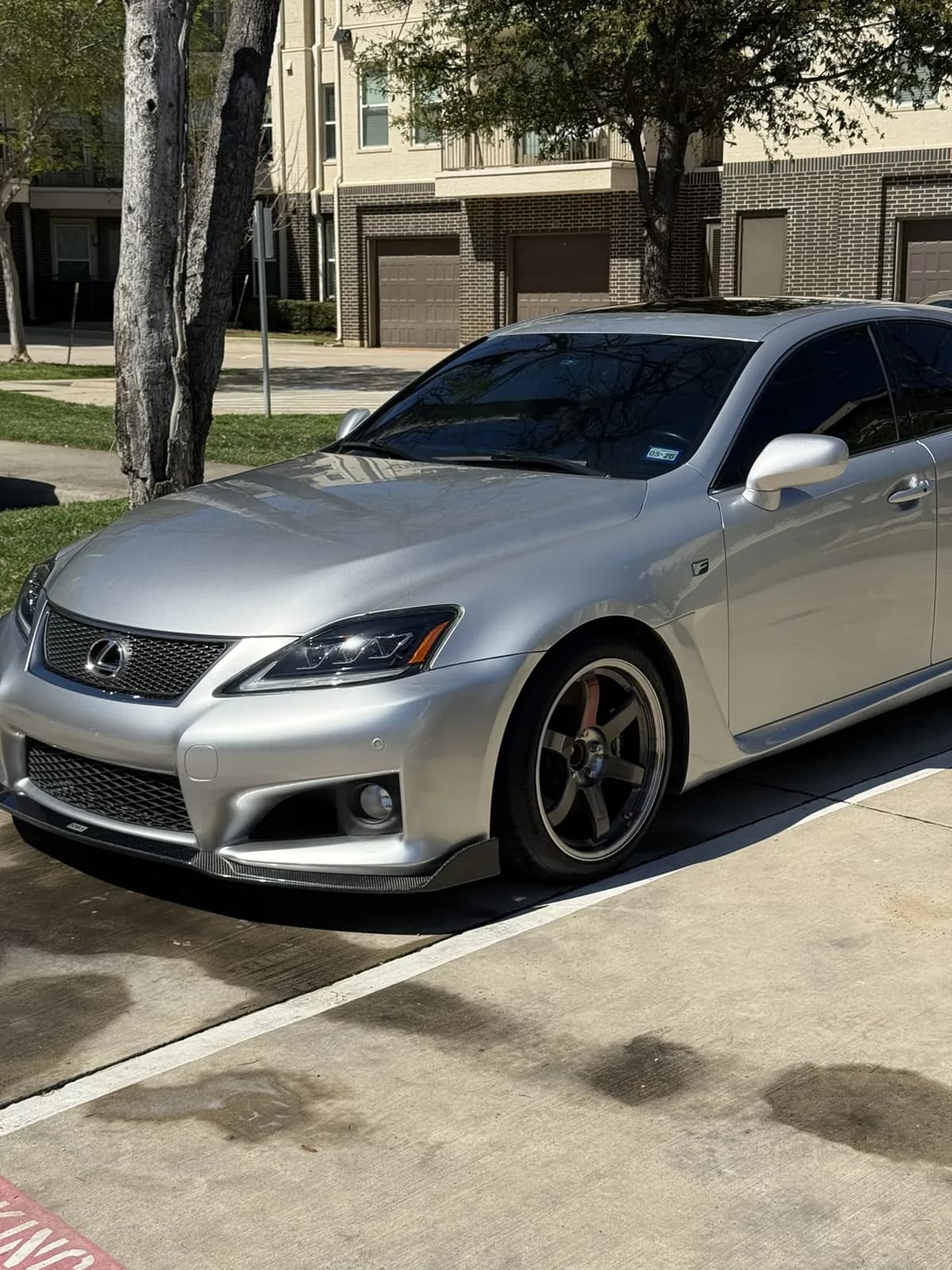 Silver sedan photographed by JX Auto Lab