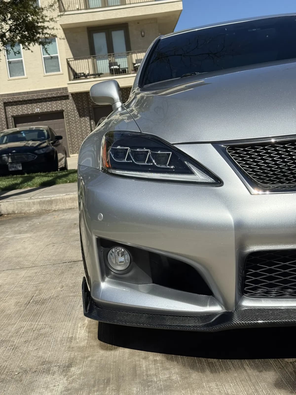 Silver sedan photographed by JX Auto Lab