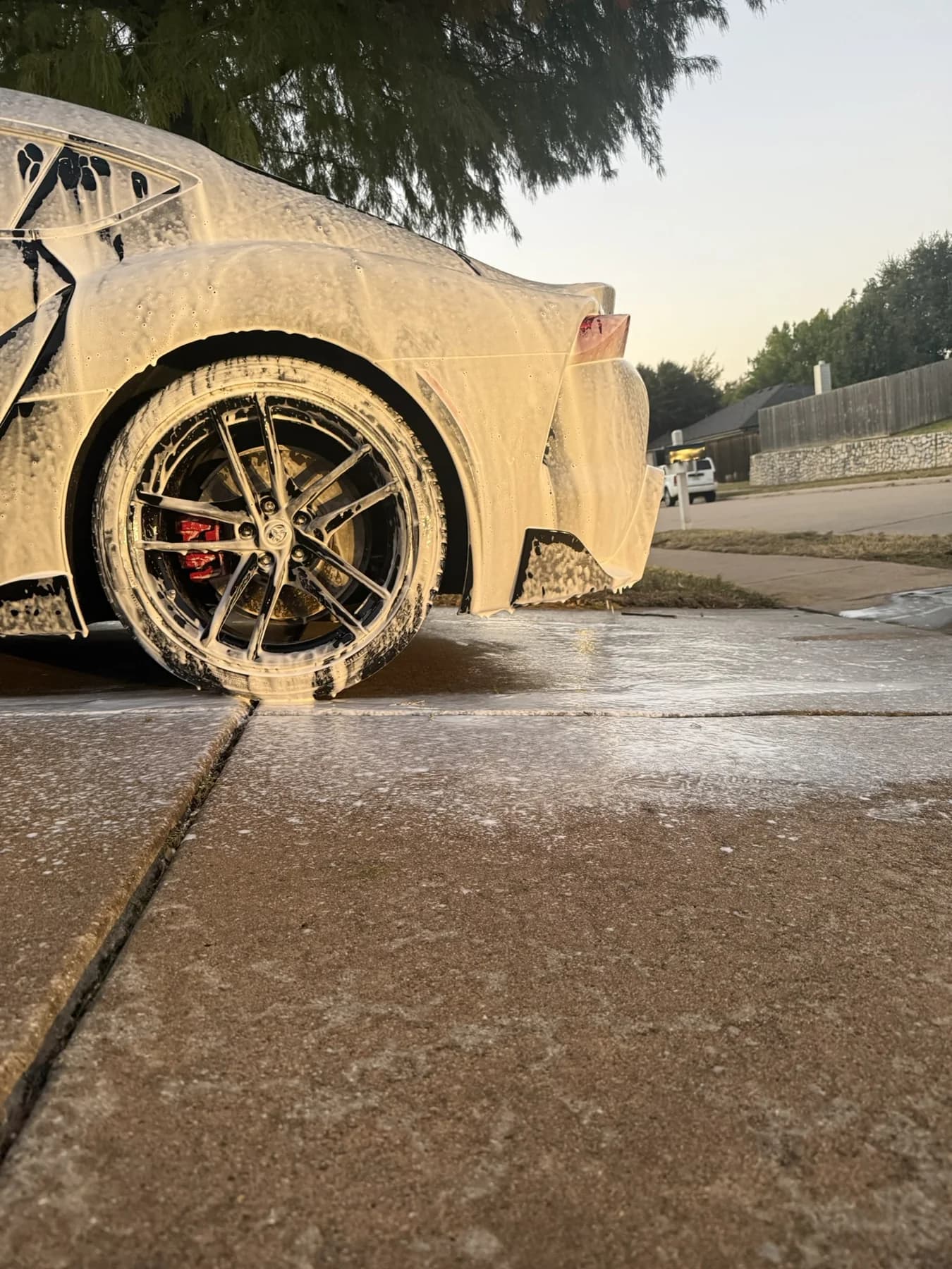 Toyota Supra covered in wash foam