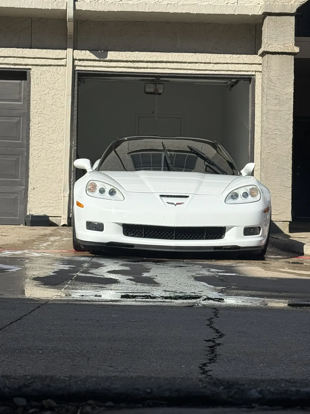 White Corvette photographed by JX Auto Lab