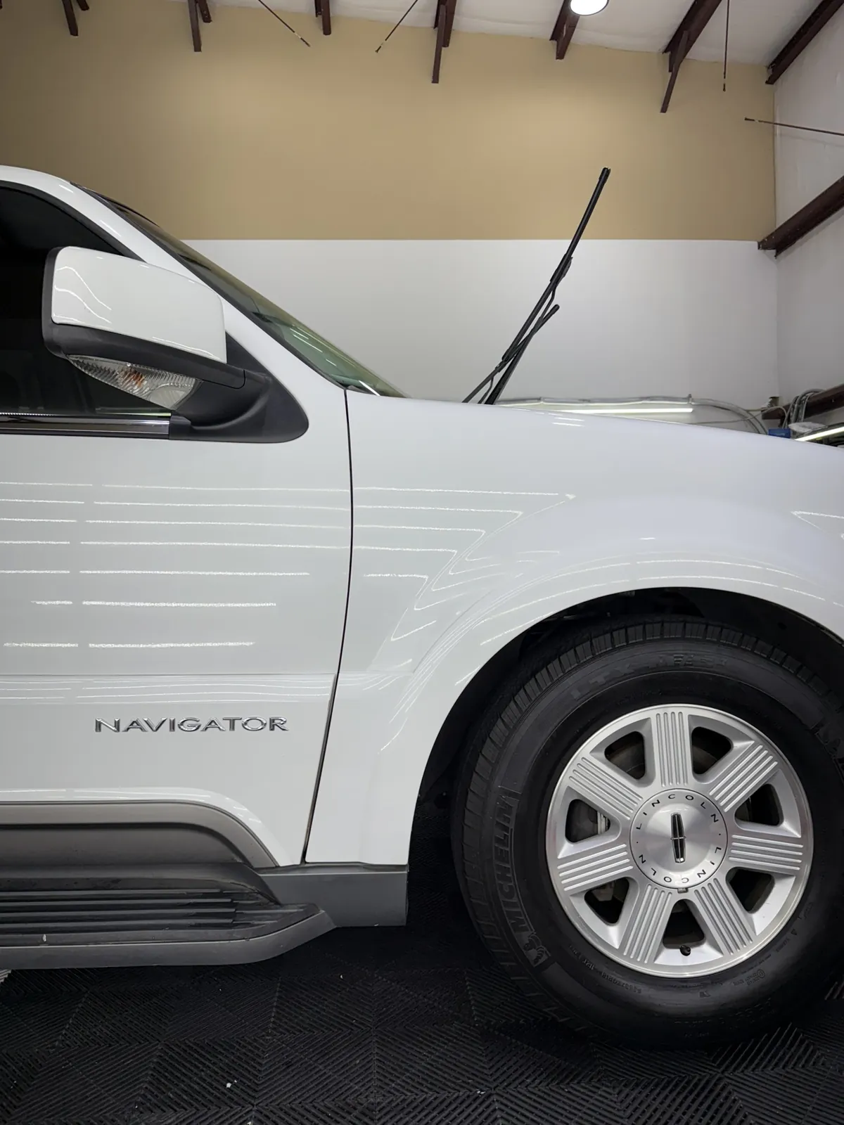 White SUV photographed by JX Auto Lab